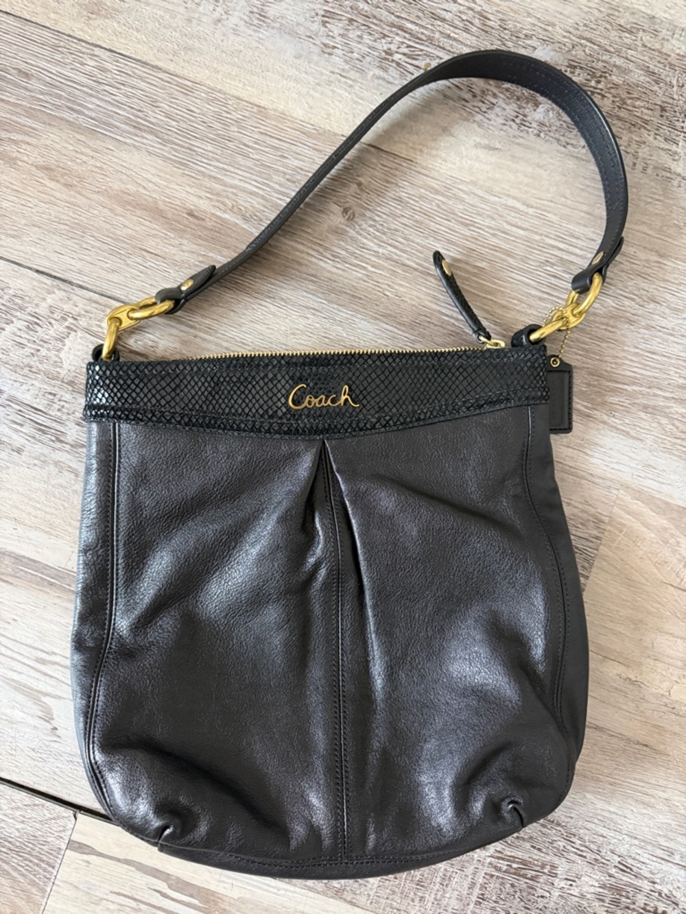 Coach Black Leather Shoulder Bag with Gold Hardware and Textured Trim